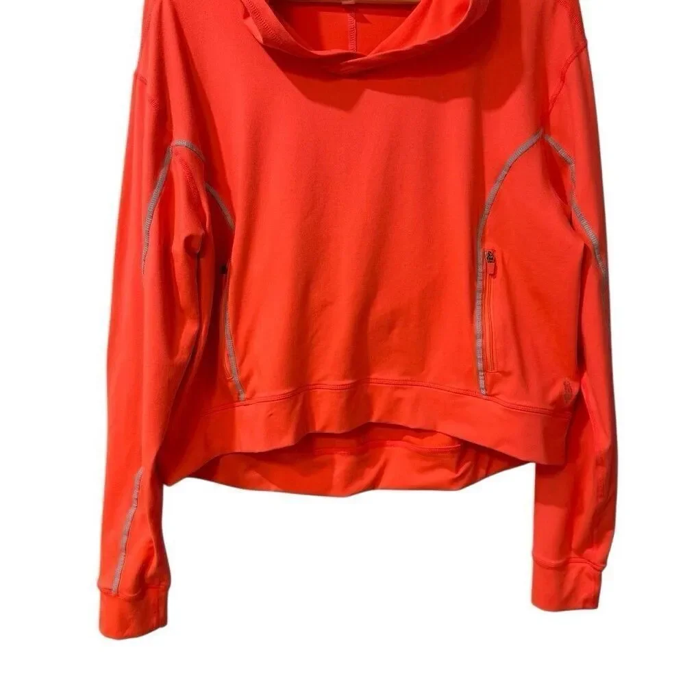 Free People Movement Neon Orange Hoodie Size Large with Reflective Strips
